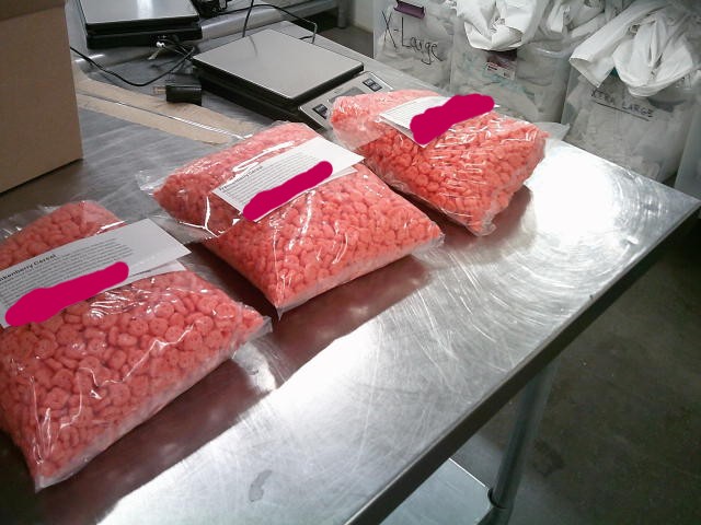 Three clear bags of Franken berry cereal with tape and labels on top.